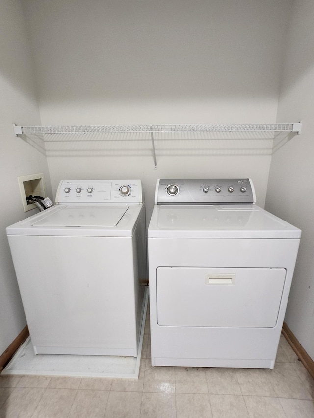 washroom with washer and clothes dryer