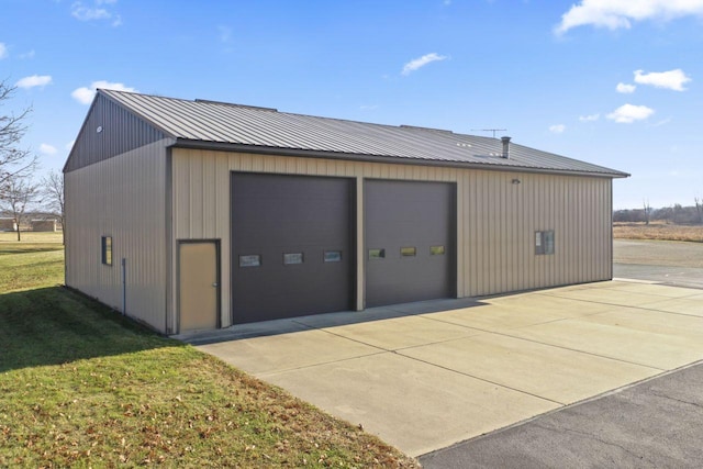 garage with a yard