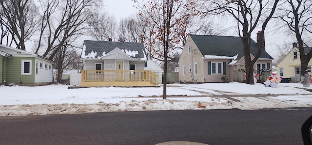 view of front of home with a wooden deck