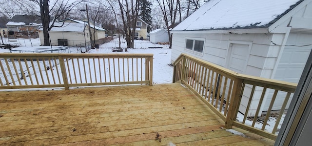 view of snow covered deck