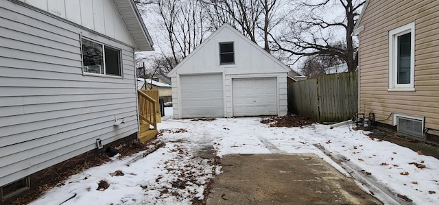 view of snow covered garage