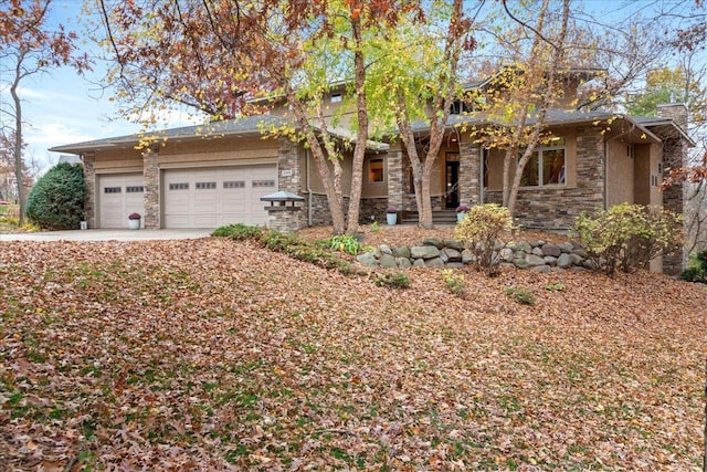 view of front of property with a garage