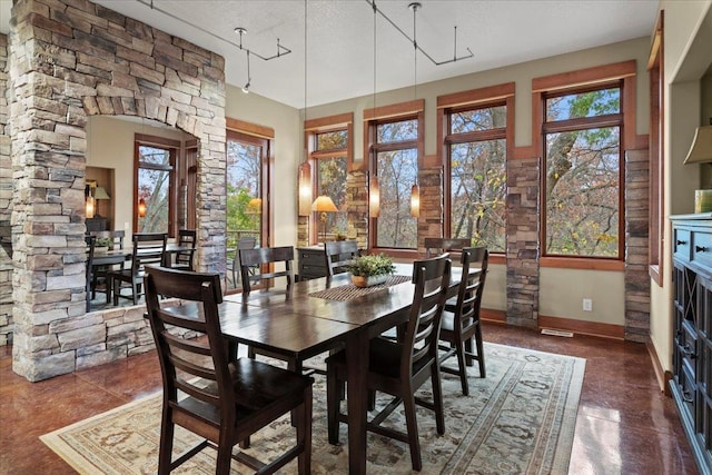 dining area featuring plenty of natural light