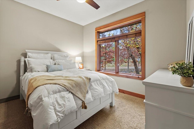 bedroom featuring ceiling fan and light colored carpet