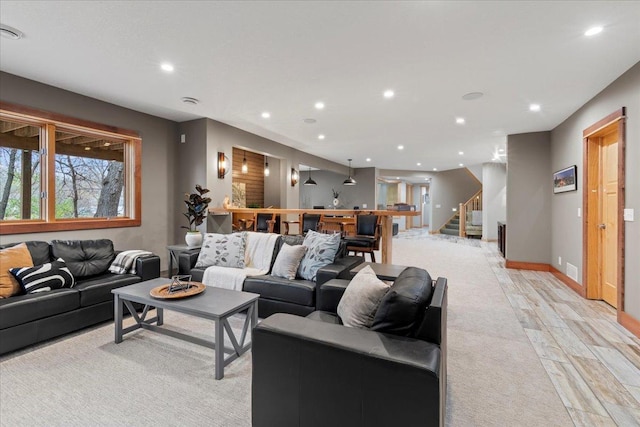 living room with light hardwood / wood-style flooring