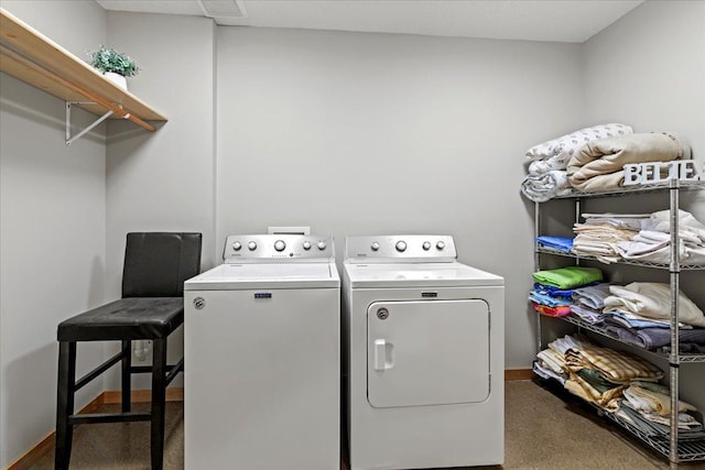 washroom with separate washer and dryer and carpet flooring