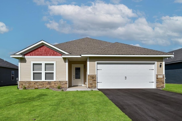 craftsman-style house with a front yard and a garage