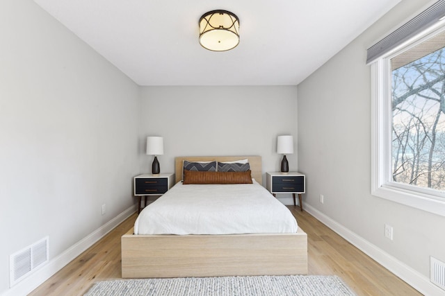 bedroom featuring light hardwood / wood-style flooring