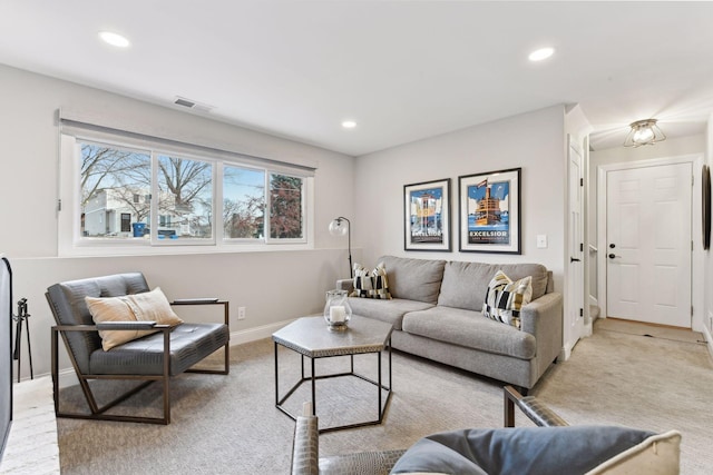 living room featuring light carpet