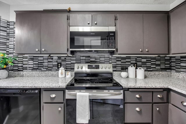 kitchen with gray cabinets, appliances with stainless steel finishes, decorative backsplash, and tile patterned floors