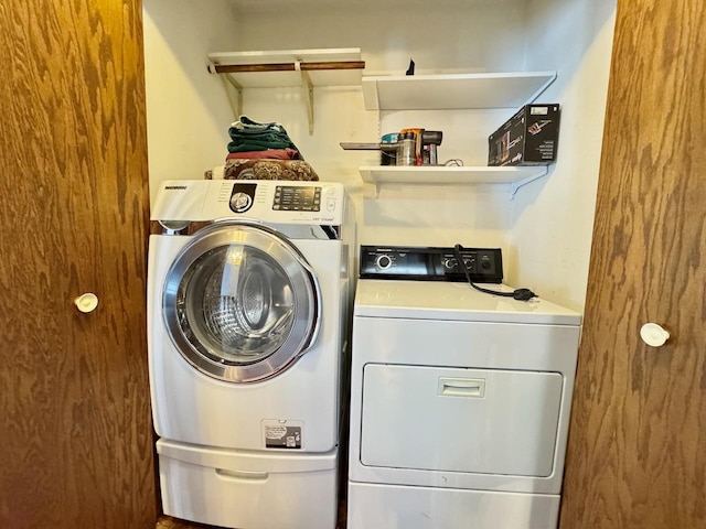 laundry room featuring independent washer and dryer