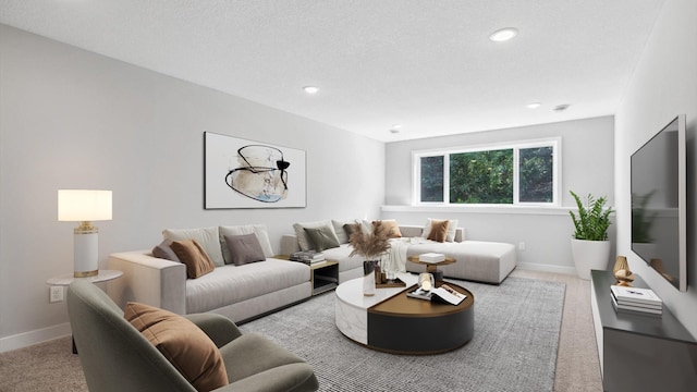 carpeted living room with a textured ceiling