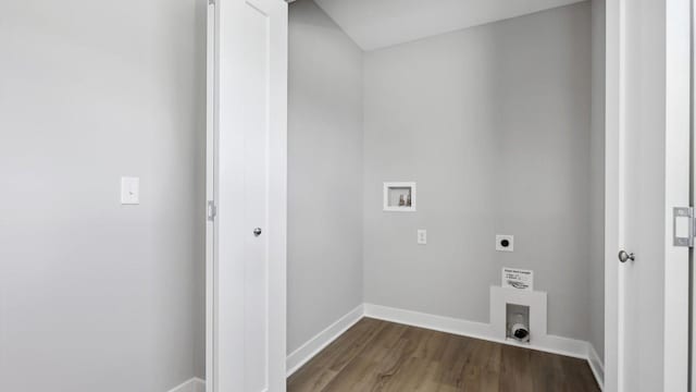 clothes washing area featuring hookup for an electric dryer, hookup for a washing machine, and dark wood-type flooring