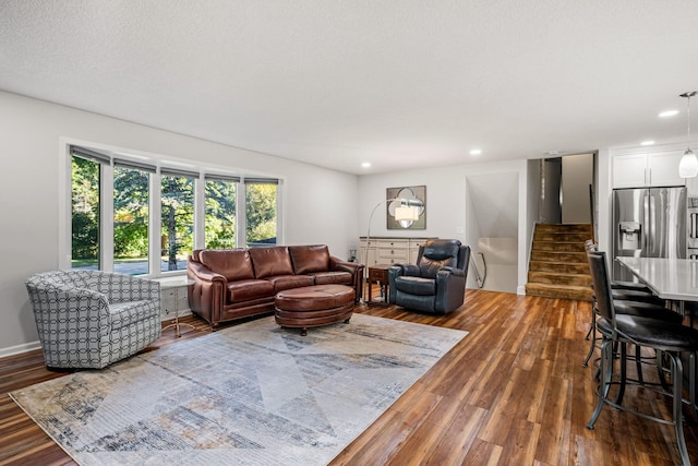 living room featuring dark hardwood / wood-style flooring