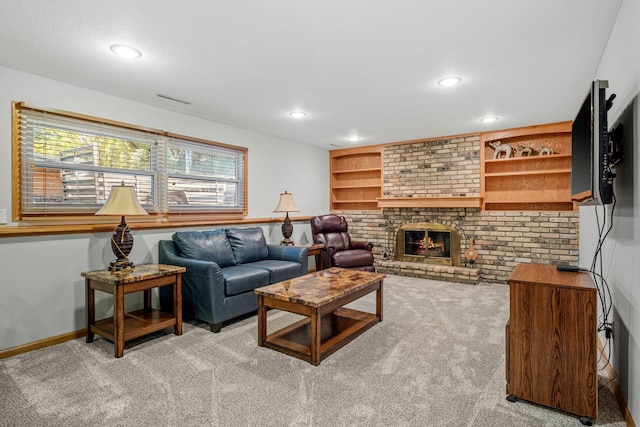 living room with light carpet, built in features, and a fireplace