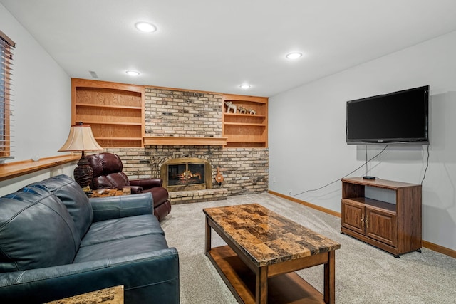 living room featuring light colored carpet, built in features, and a fireplace