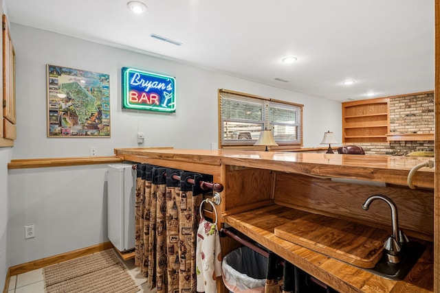 bar with tile patterned flooring