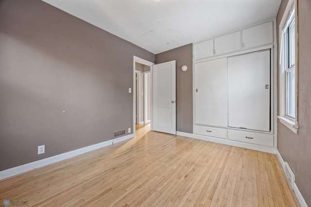 unfurnished bedroom with light hardwood / wood-style flooring