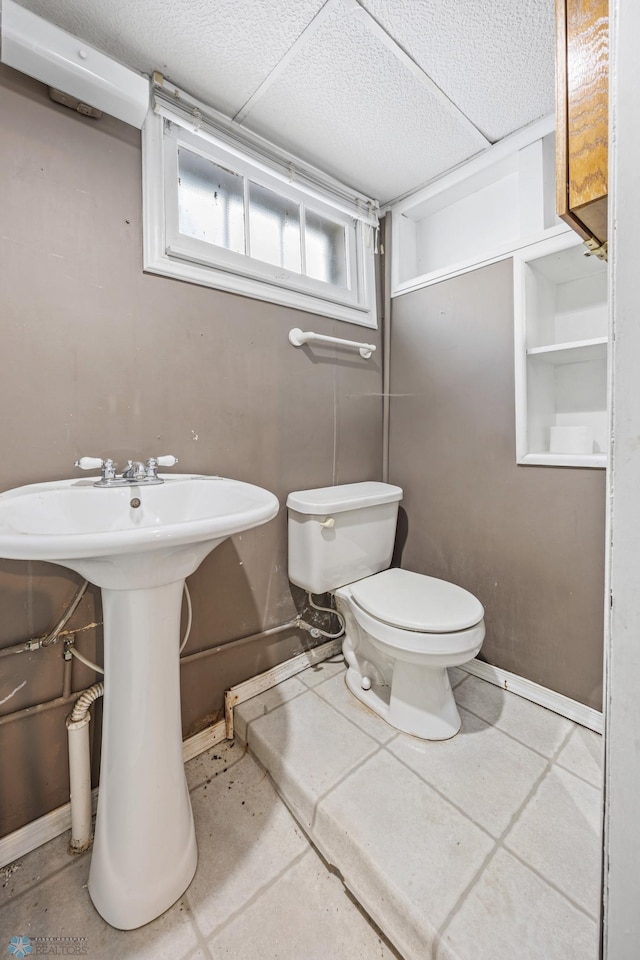 bathroom with toilet and sink