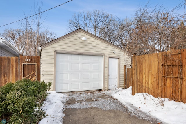 view of snow covered garage