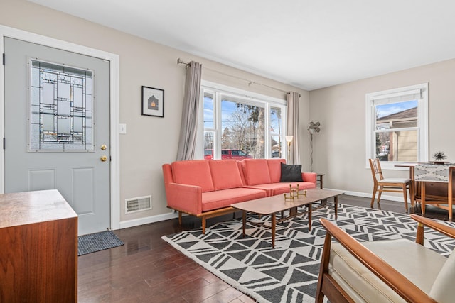 living room with dark hardwood / wood-style floors