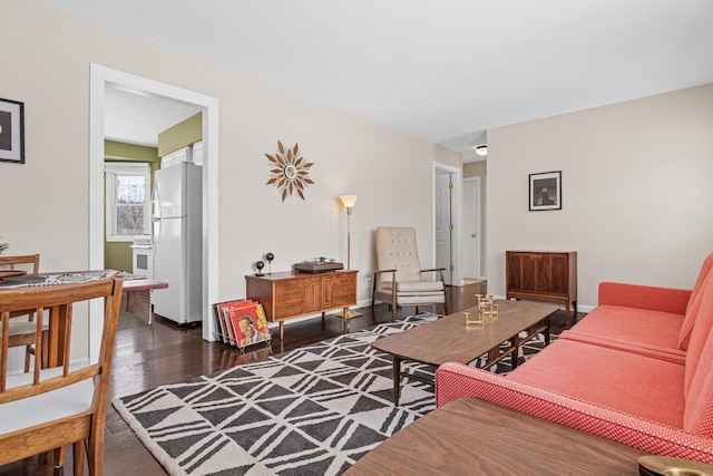 living room featuring dark hardwood / wood-style floors