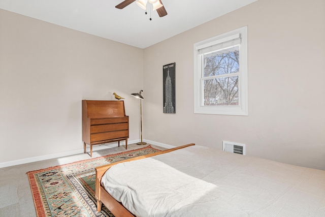 bedroom with ceiling fan and carpet