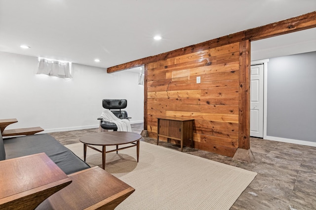 living room with wooden walls