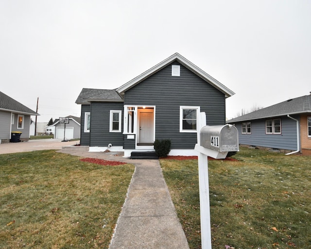 view of front of home with a front lawn