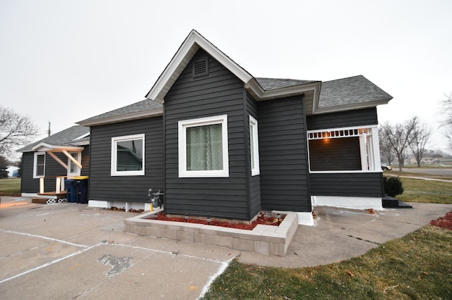 back of house featuring a patio area