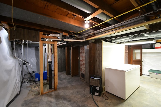 basement featuring fridge