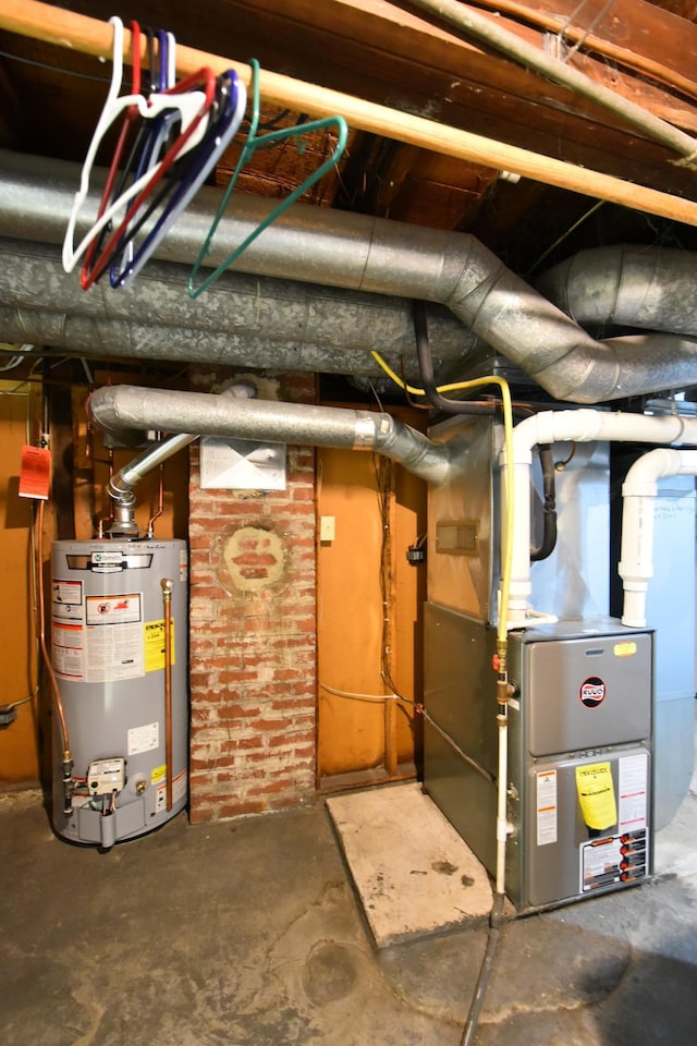 utilities featuring heating unit and gas water heater