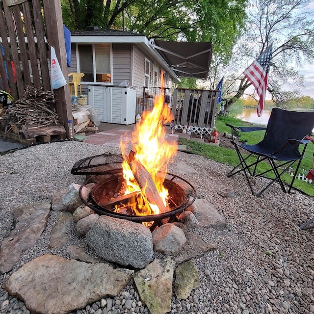 view of patio / terrace with an outdoor fire pit