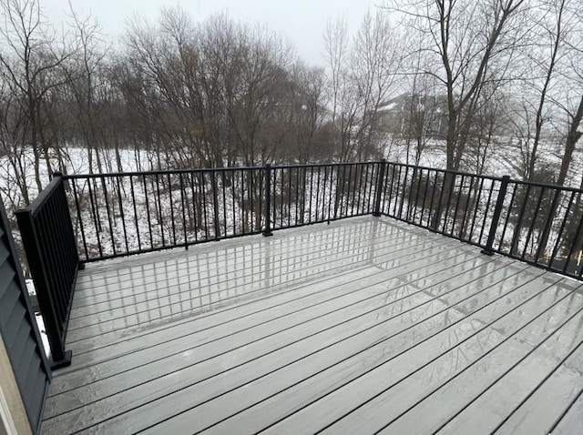 view of snow covered deck