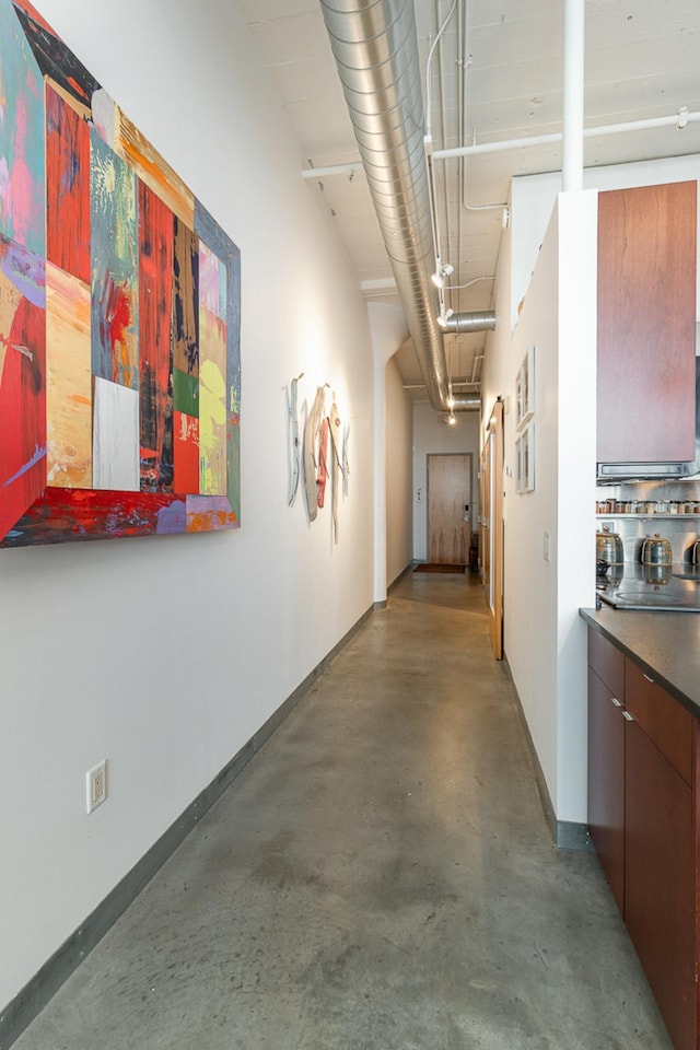 hallway featuring concrete floors