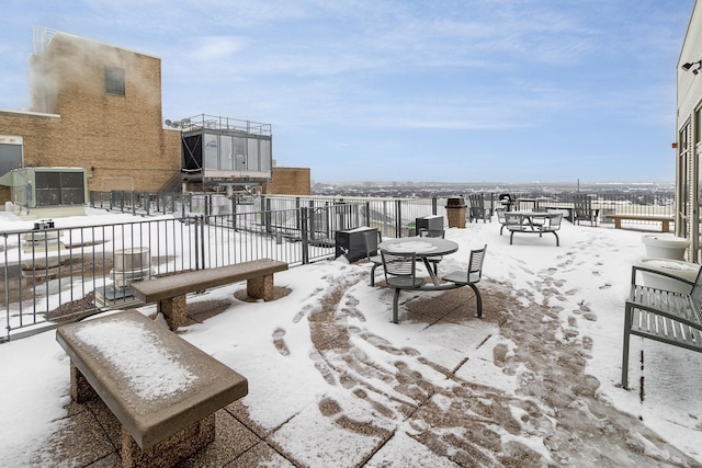 view of snow covered patio