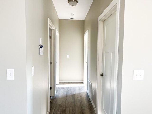 hall featuring dark hardwood / wood-style floors