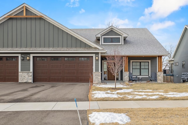 craftsman-style house with a garage