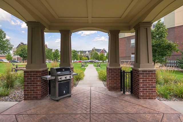 view of patio / terrace featuring grilling area and covered porch