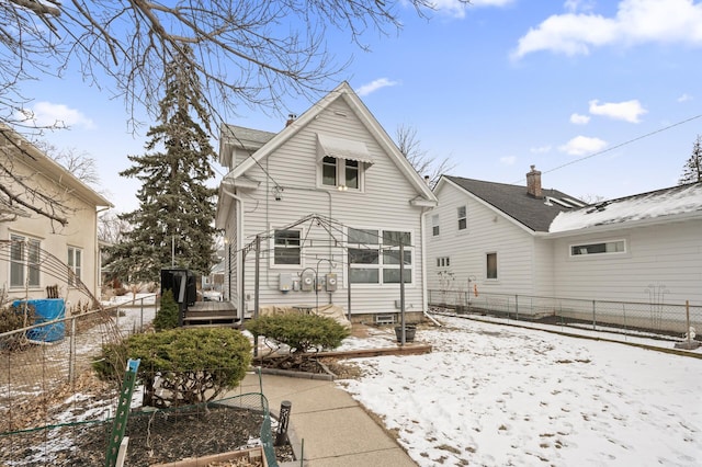 view of snow covered property