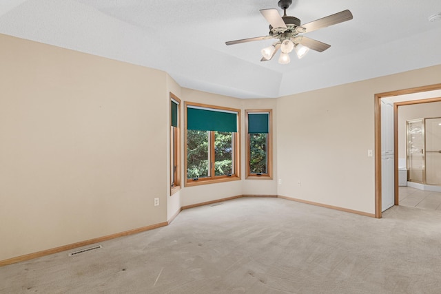 unfurnished room featuring visible vents, ceiling fan, baseboards, and carpet