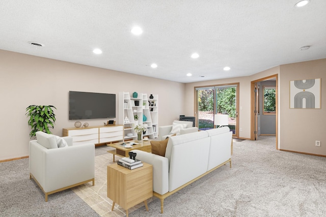 living area featuring visible vents, baseboards, light carpet, recessed lighting, and a textured ceiling