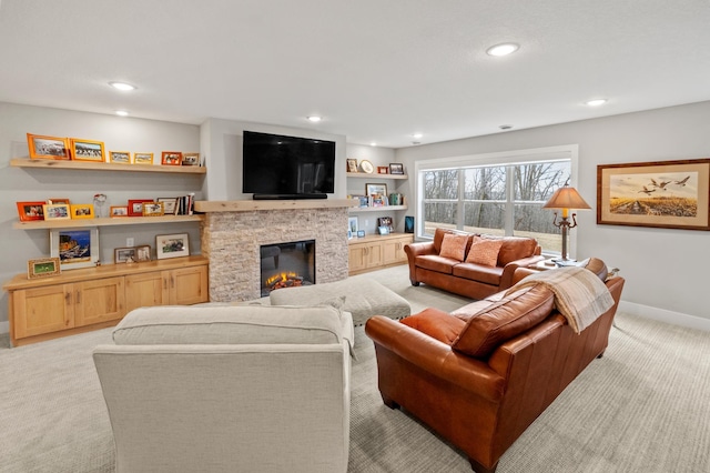 living room with light colored carpet and a fireplace