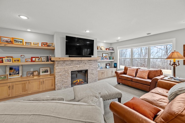 living room with a fireplace and light carpet