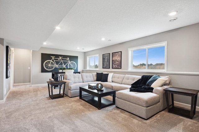 living room with a textured ceiling