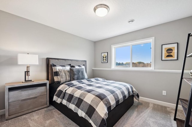 bedroom with light carpet