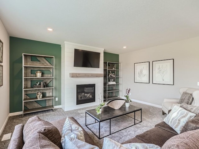 living room with light carpet and a fireplace