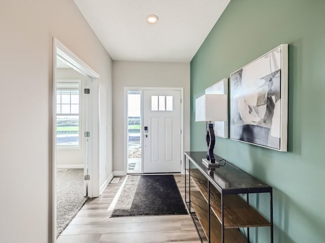 entrance foyer with light hardwood / wood-style floors