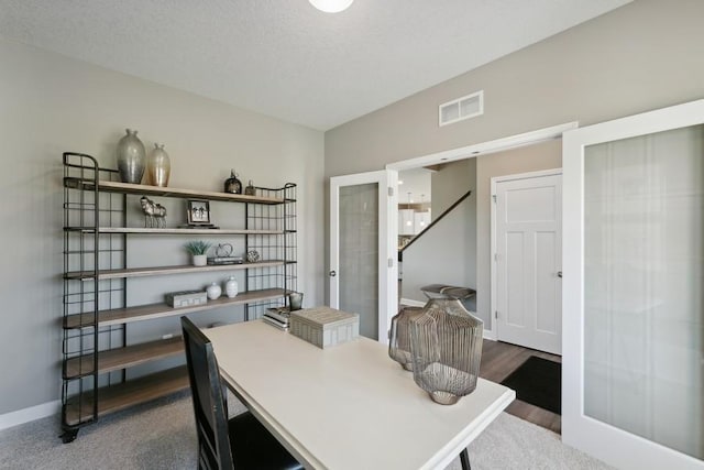 office area featuring french doors and hardwood / wood-style flooring