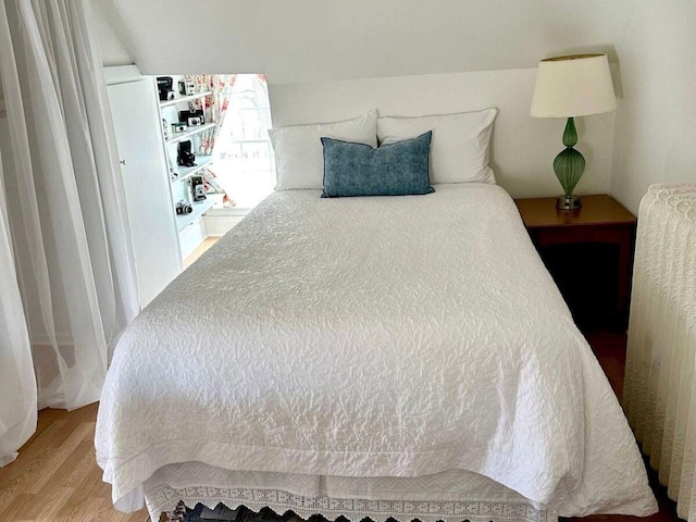 bedroom with light wood-type flooring